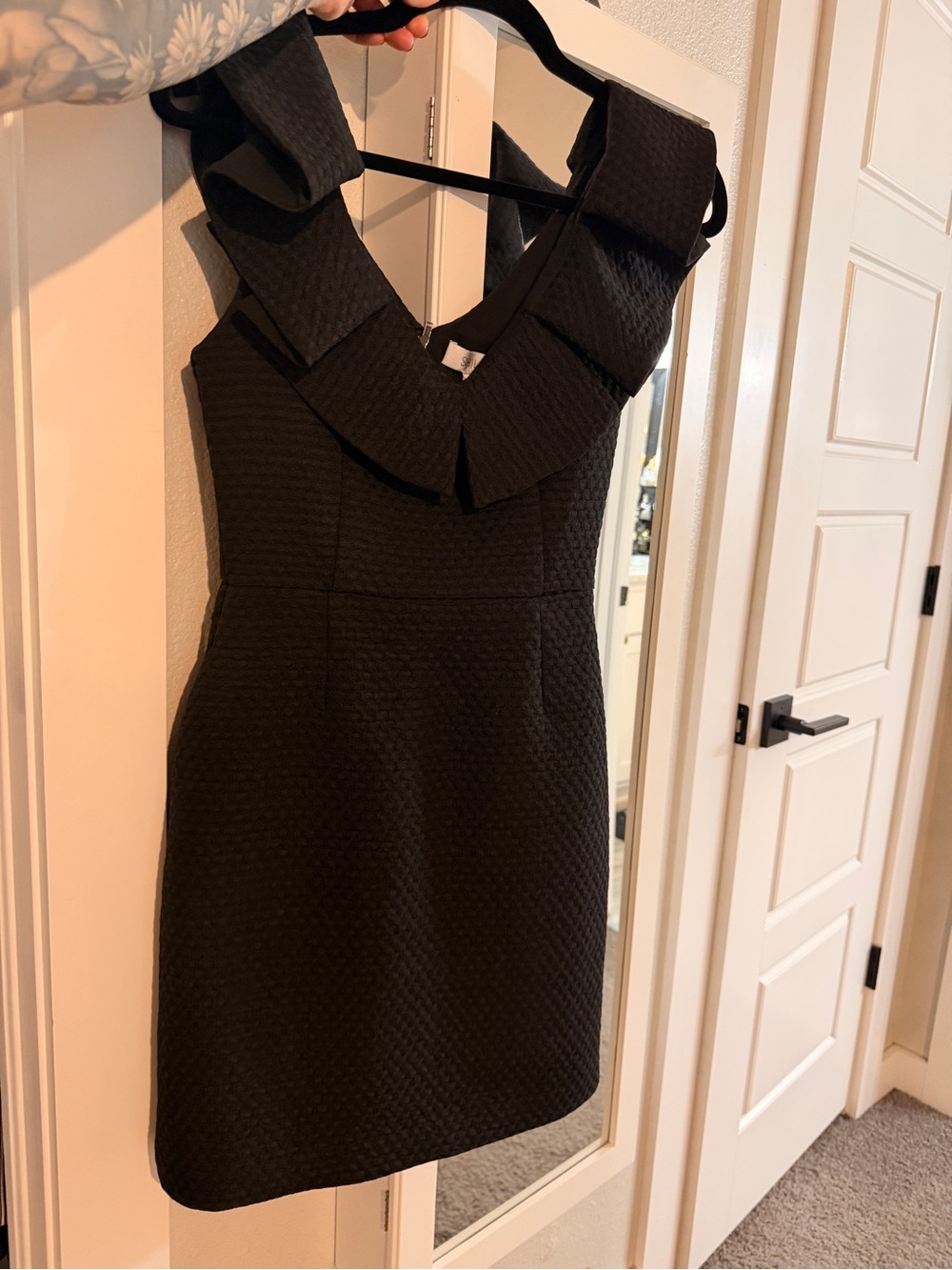 Black Textured Mini Dress with Statement Ruffle Neckline